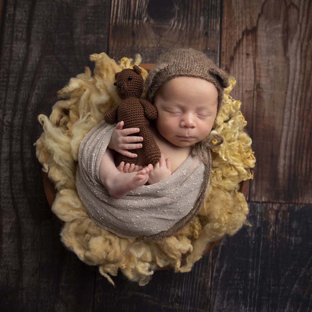 little baby with teddy bear