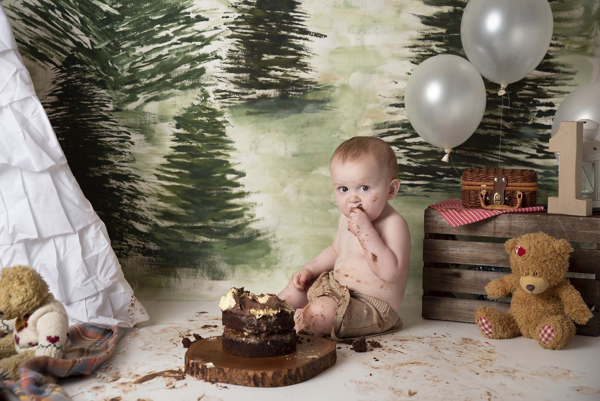 cakesmash photoshoot with little boy photographed by cake smash photography Manchester