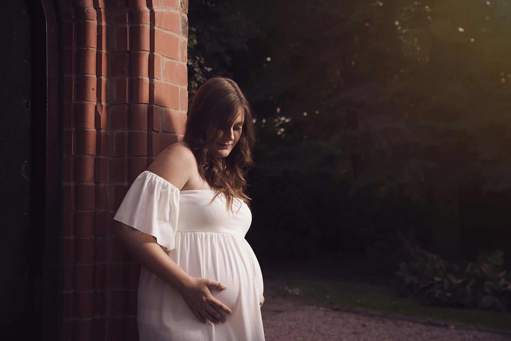 Outdoor maternity photo shoot in a park photographed by Maternity Photographer Manchester