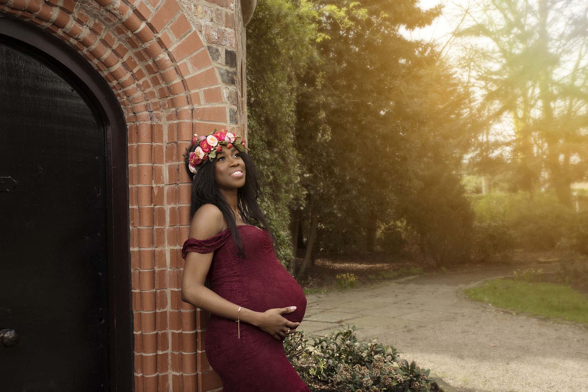 beautiful pregnant mum posing in the park photographed by Maternity Photographer Manchester