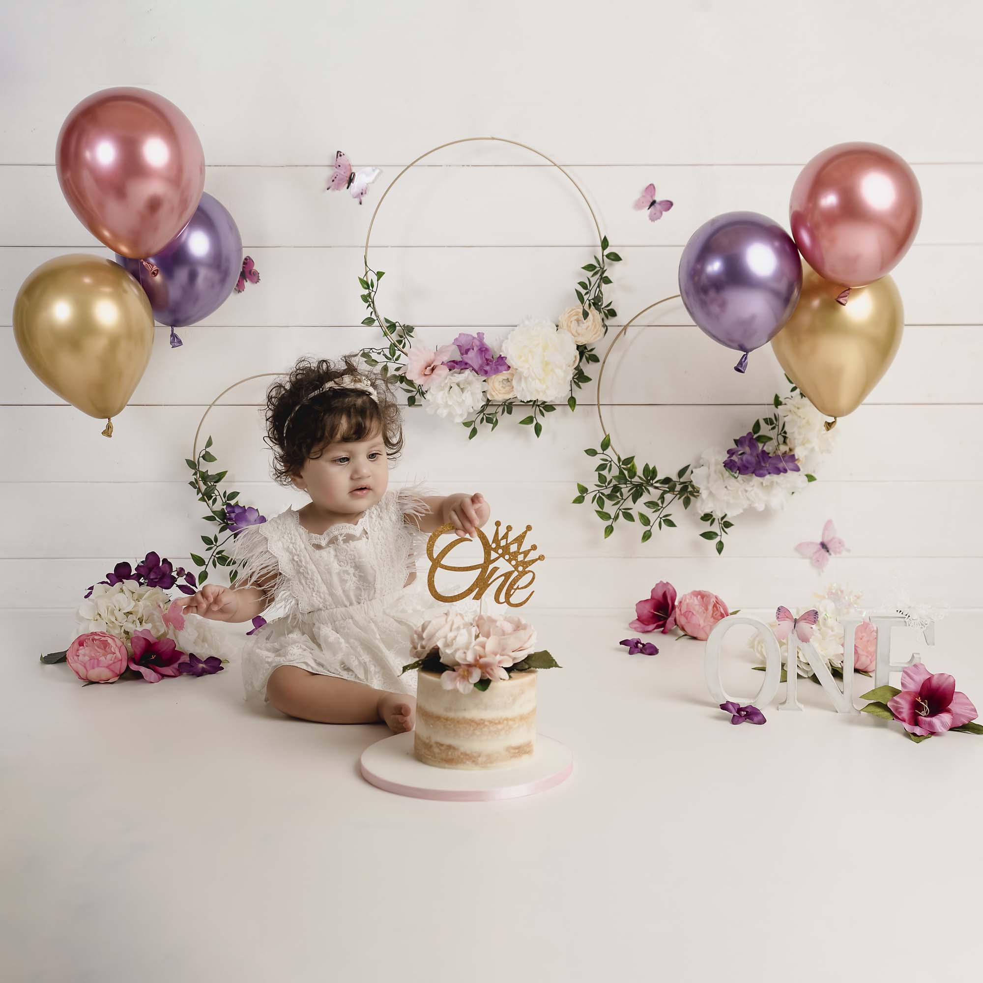 baby with cake newborn photography by newborn photographer manchester