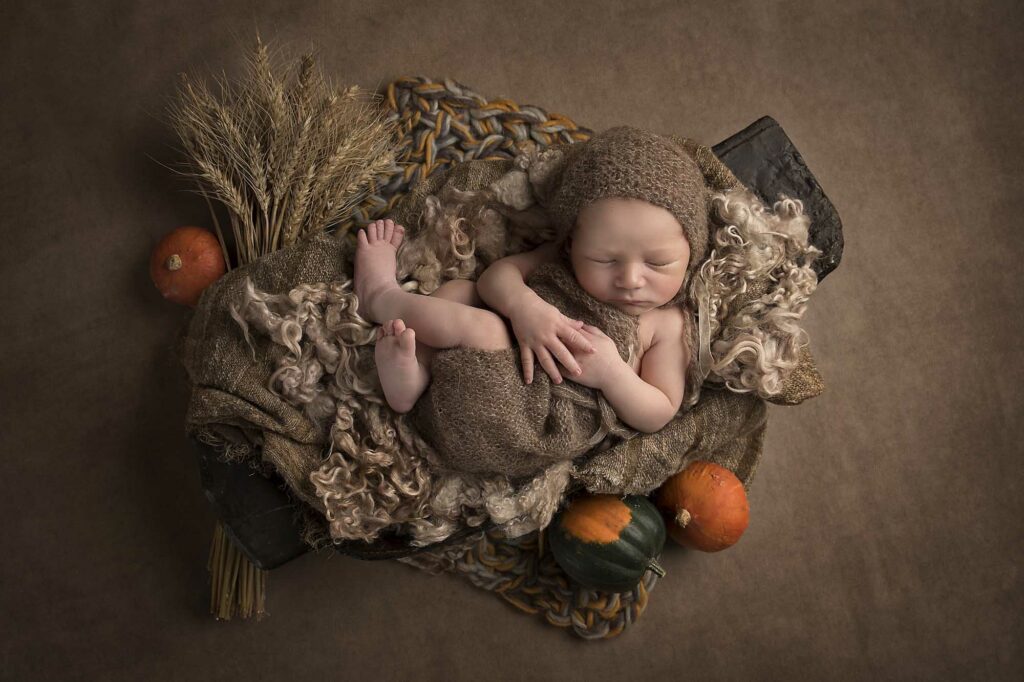newborn baby with autumn set
