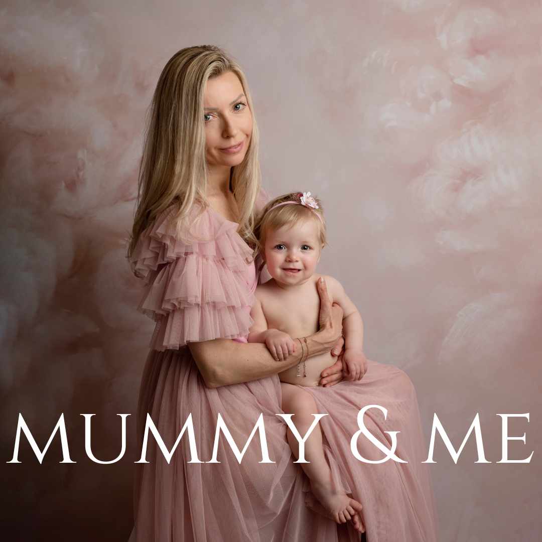 a woman holding a baby